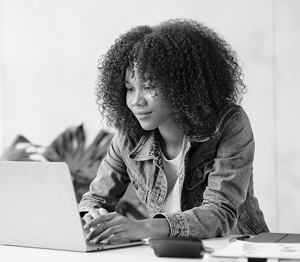 young person working on a laptop