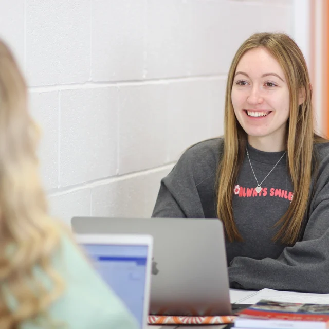 higher education students studying in the LRC