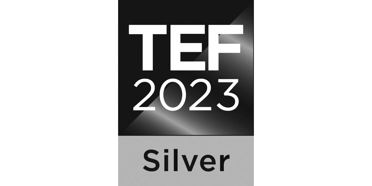 The TEF 2023 Silver award logo featuring the text “TEF 2023” in a black gradient square above a silver panel labelled “Silver.”