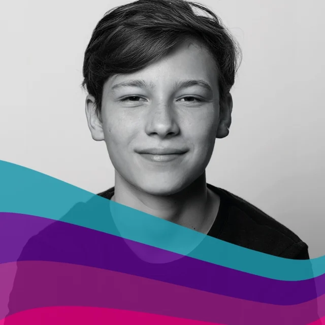 Black‑and‑white portrait of a young person facing the camera, with abstract coloured wave shapes across the lower part of the image.