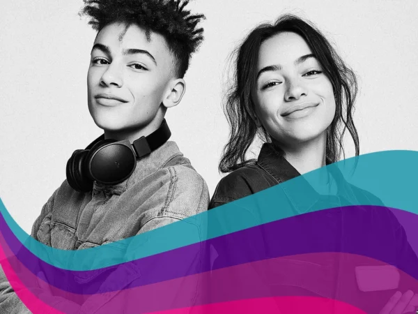 Two people facing the camera, one wearing headphones, with a colourful abstract wave design overlay at the bottom.