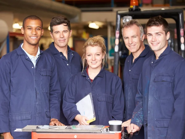 Portrait Of Staff Standing In workshop