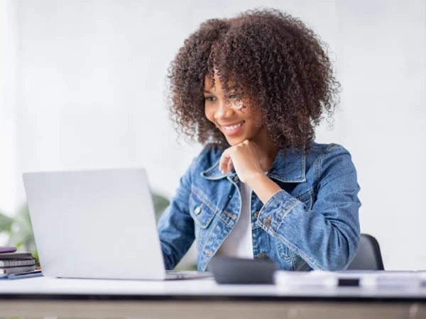 young person working on a laptop