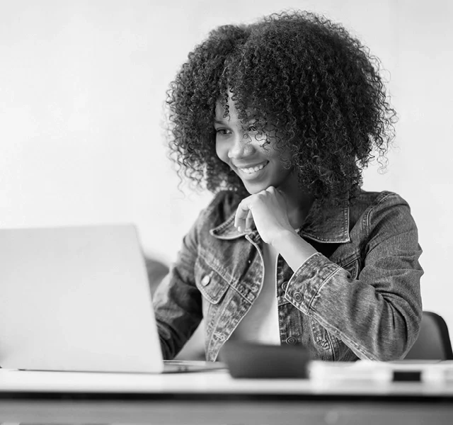 young person working on a laptop
