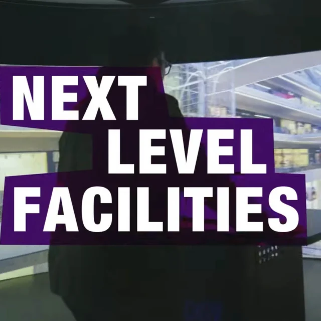 Large white text reading “Next Level Facilities” over a purple graphic, with a blurred immersive digital space shown in the background.