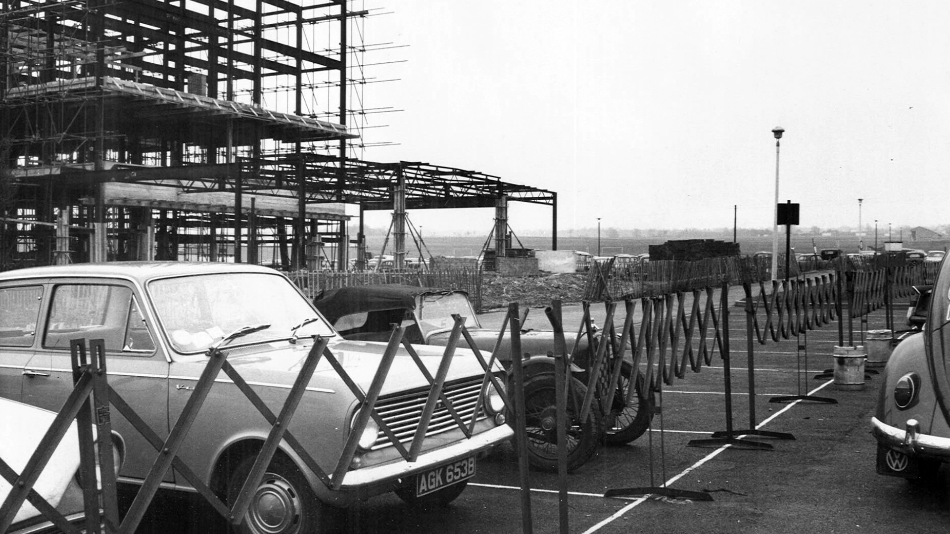 Historic black and white photo of the construction site scaffolding.