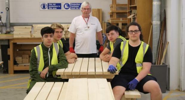 Carpentry students build picnic benches for Epsom business